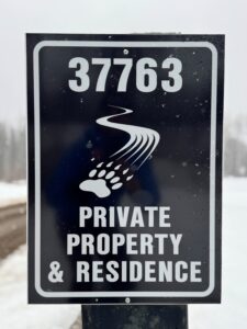 Bear Paw Heliskiing Sign